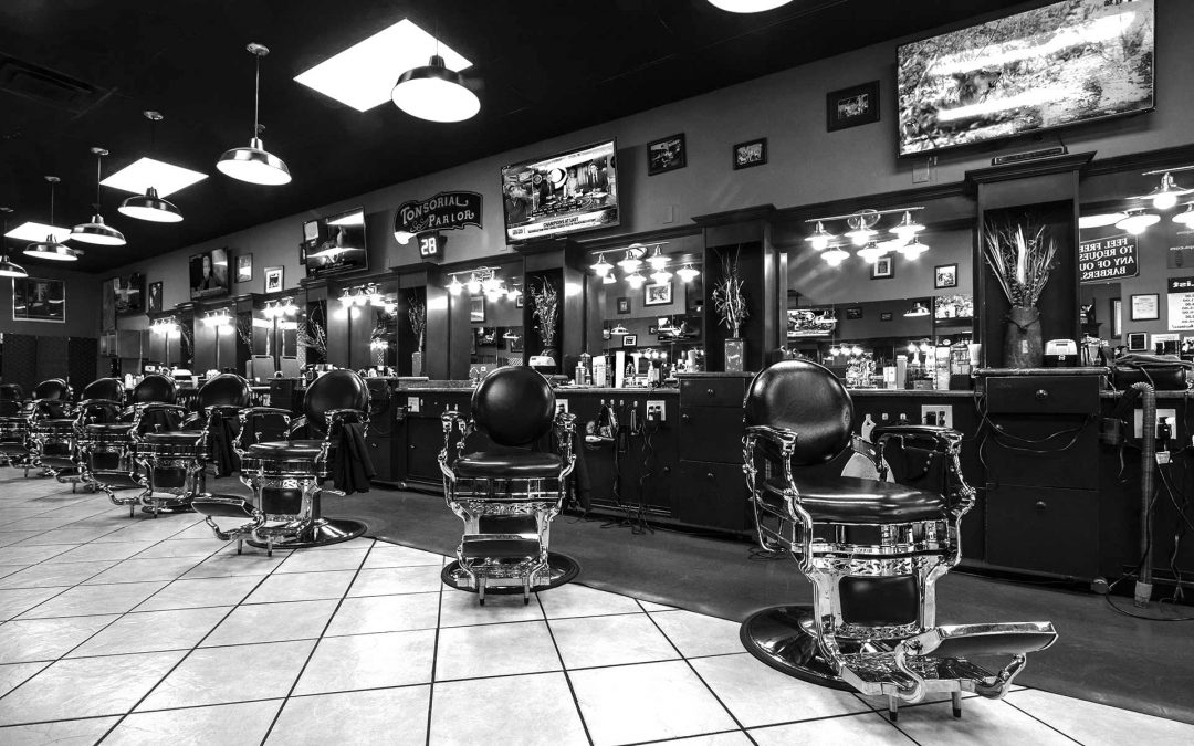 black & white barbershop front of inside